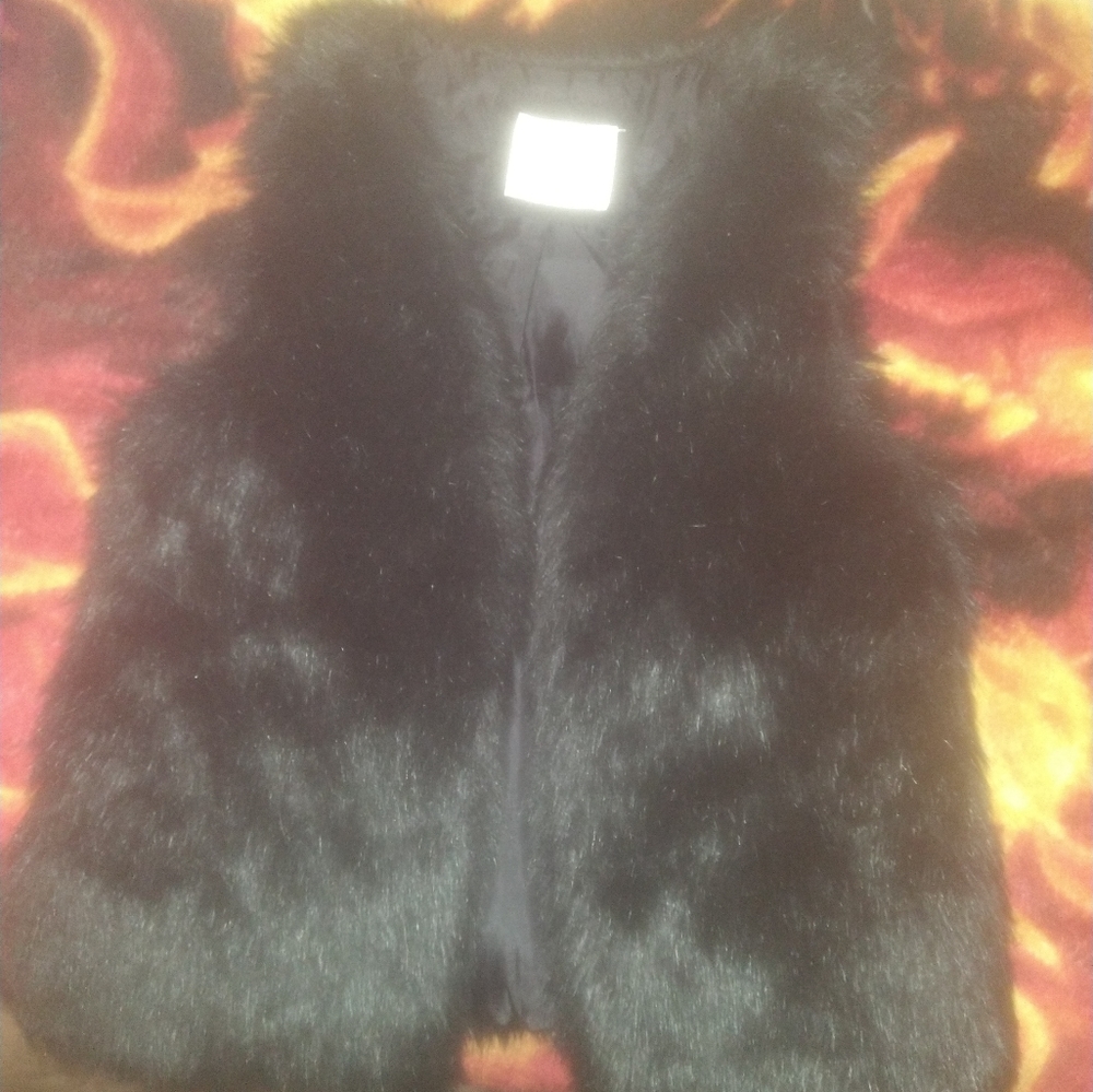 Justice fur vest